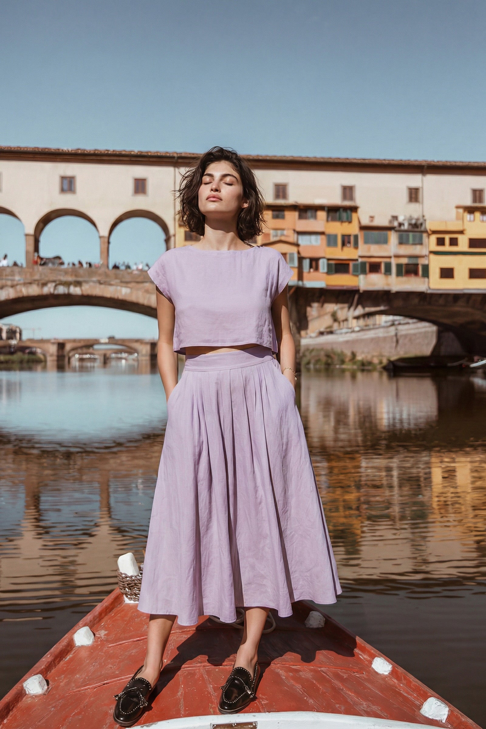 Model wearing linen dress set - crop top and high waist skirt