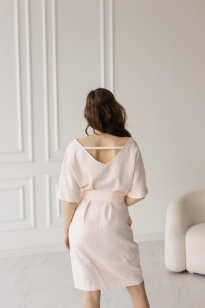 Back view, petal pink dress, V-back, delicate strap, breathable linen.