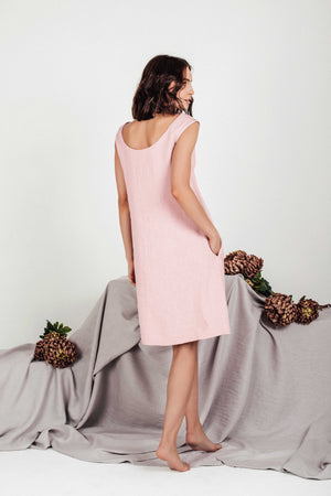 Back view of the VELA linen shift dress in dusty rose by SonFre, highlighting the elegant deep scoop back design and relaxed silhouette.