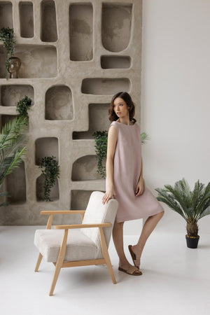 Dusty rose linen shift dress, knee-length, breathable fabric, casual lounge style.