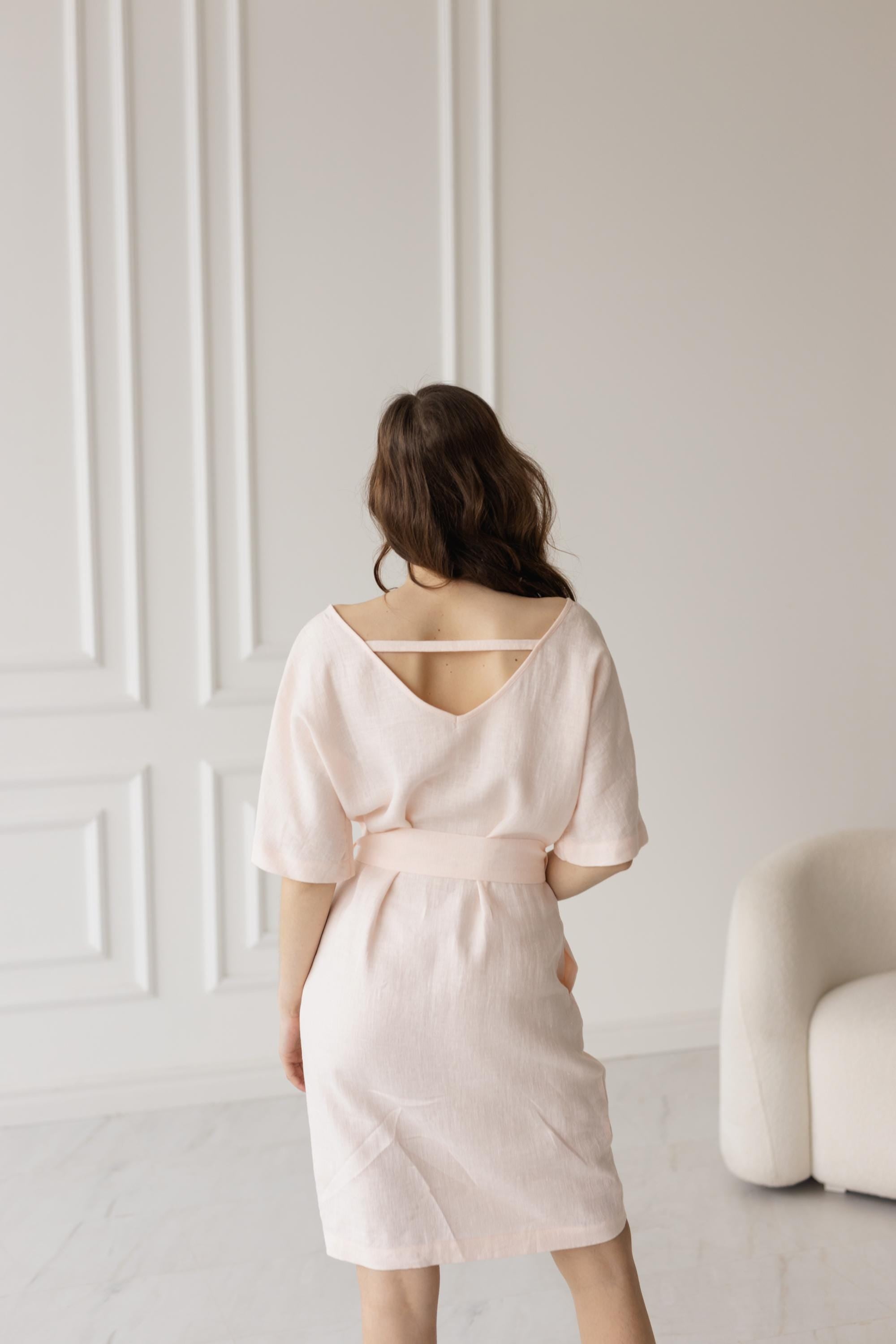 Back view, petal pink dress, V-back, delicate strap, breathable linen.