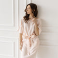 Petal pink linen shift dress, half sleeves, tie waist, elegant casual style.