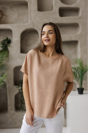 Women's boxy linen blouse in taupe, relaxed fit breathable top made from natural 100% linen. Features a minimalist round neckline, short sleeves, and a loose, oversized fit. Perfect for casual and chic styling in all seasons.